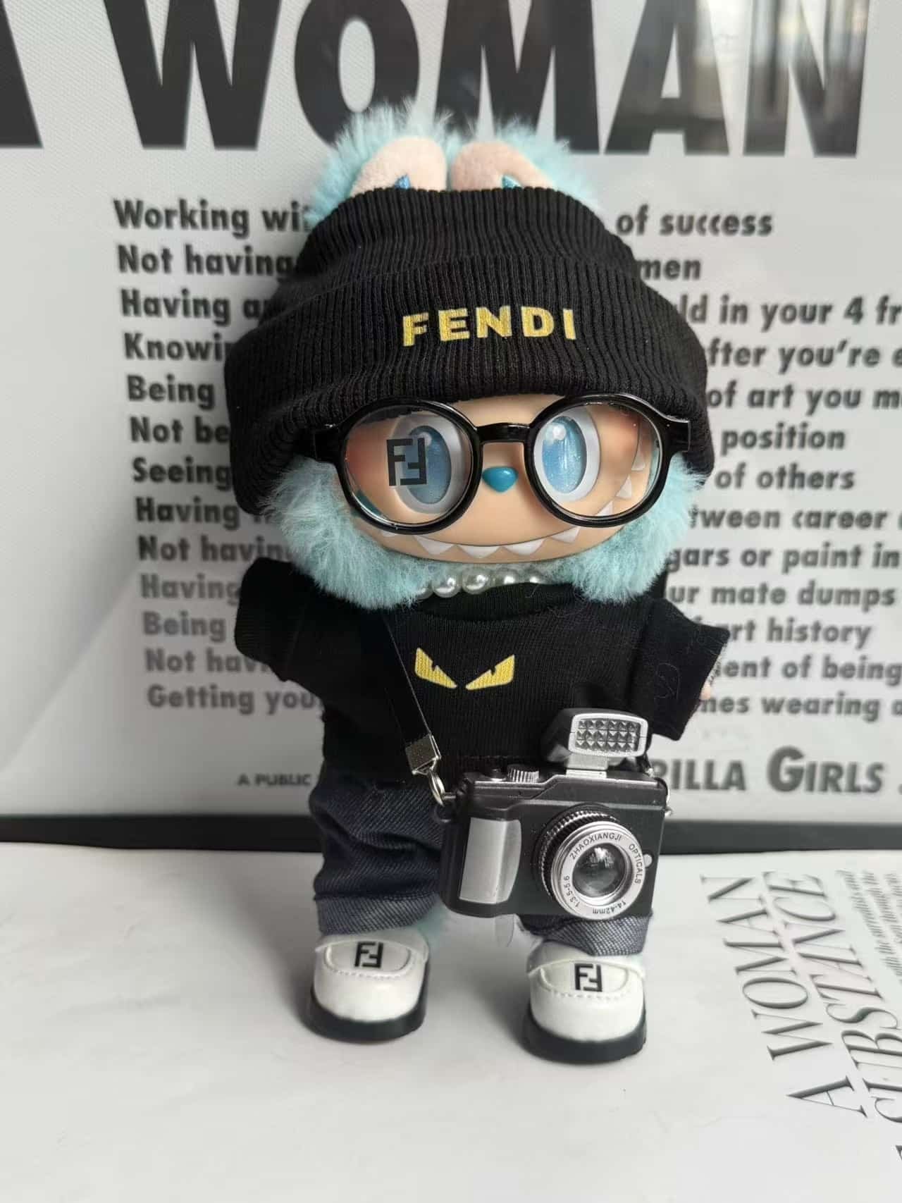 A black top + jeans + shoes + hat + camera + glasses + necklace Labubu FENDI Style Clothing Collection - Image 1